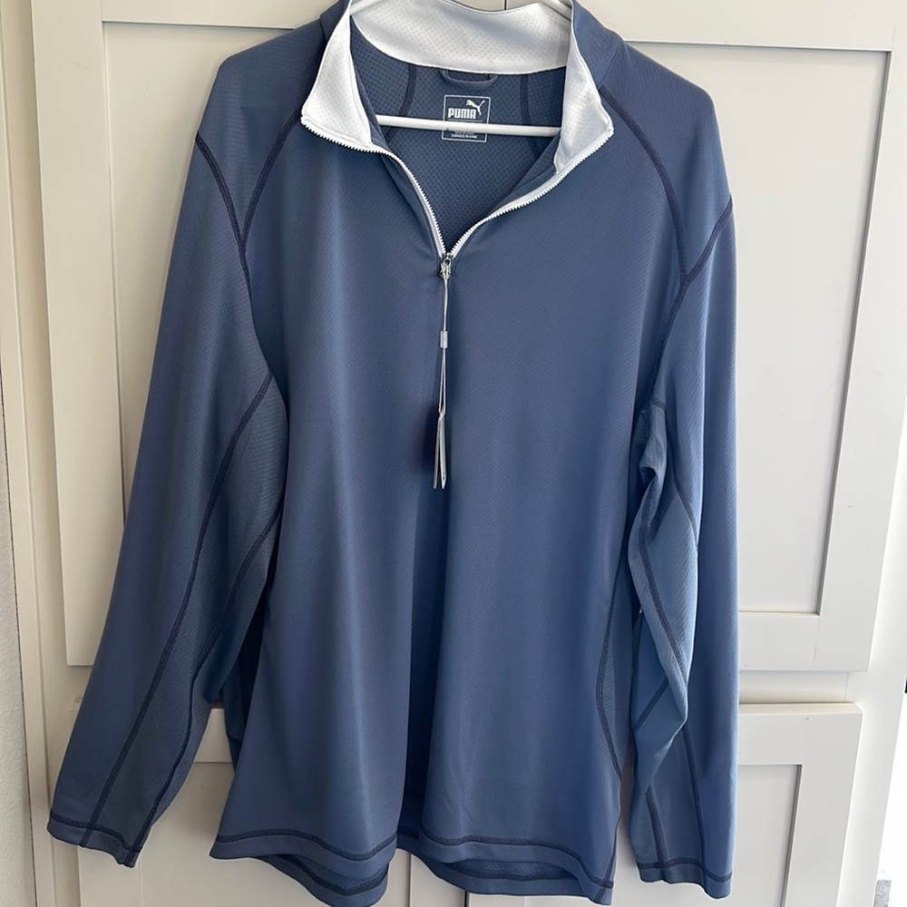 Men’s puma golf tech quarter zip pull over.